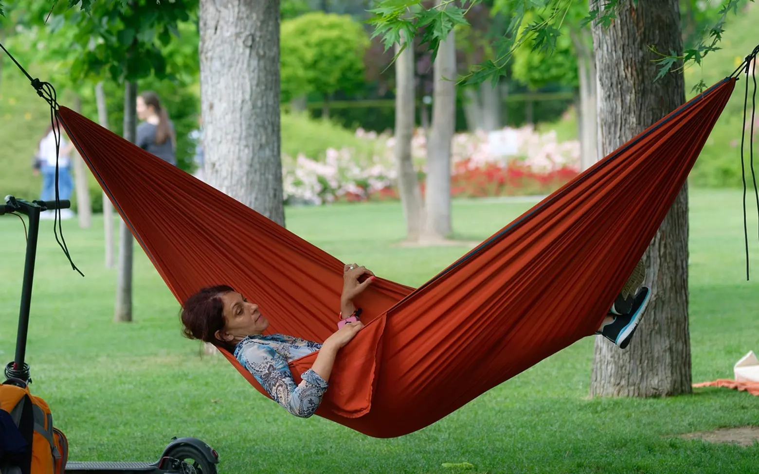 Woman, relaxing and hammock
